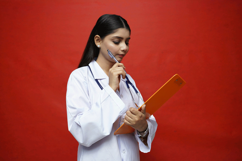 Doctor holding piece of paper