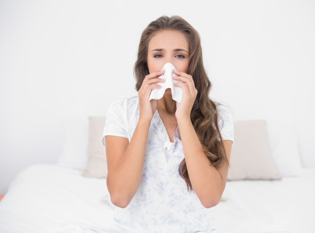 'Reduce the misery' and get a flu jab, experts urg
