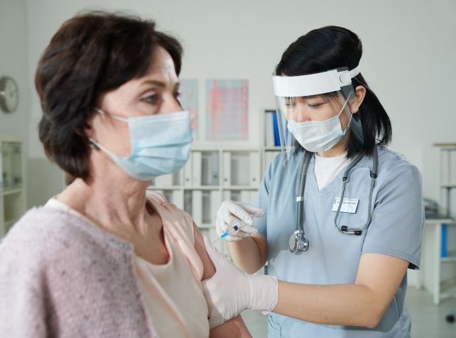 US vaccine advisers abandon broad COVID shot suppo