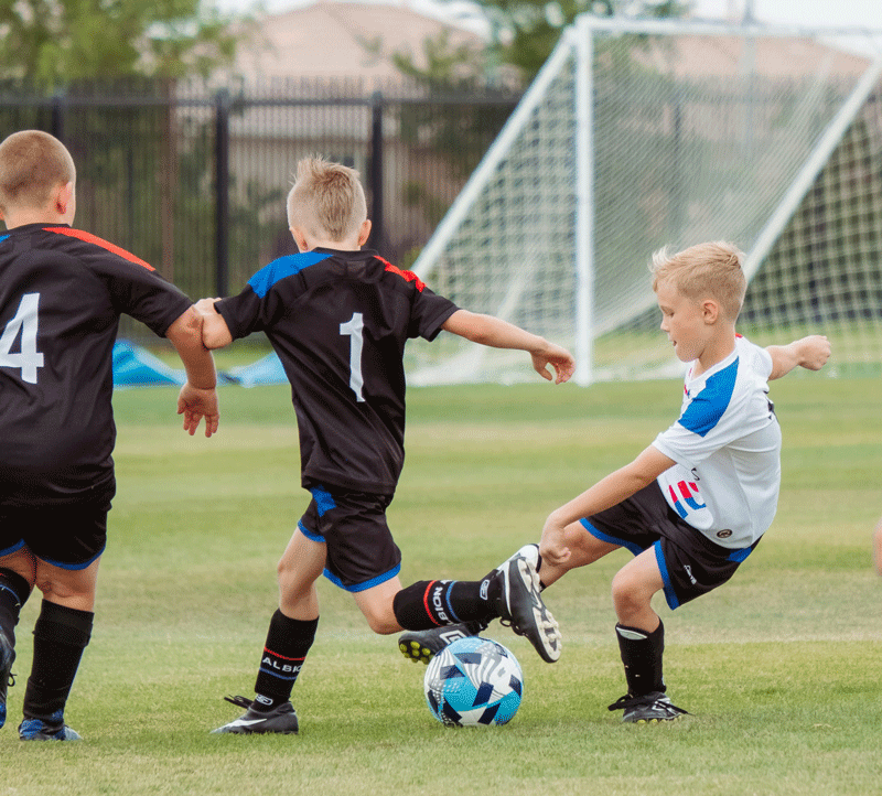 Kids playing soccer