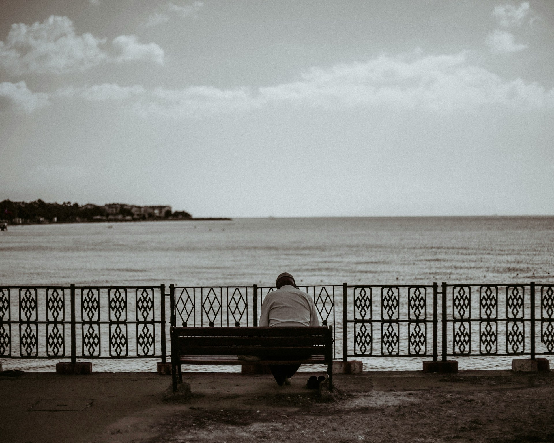 Older person sitting alone